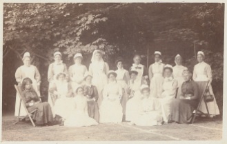 Image from a postcard featuring a group of midwives in uniform (archive reference RCMS/86)